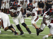 Oregon State linebacker Jack Colletto, who also plays on offense, carries the ball for a touchdown against Fresno State during the first half of an NCAA college football game in Fresno, Calif., Saturday, Sept. 10, 2022.