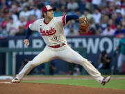 Los Angeles Angels starting pitcher Shohei Ohtani throws to a Seattle Mariners batter during the first inning of a baseball game in Anaheim, Calif., Saturday, Sept. 17, 2022.