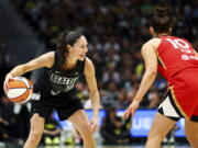 Seattle Storm guard Sue Bird (10) drives against Las Vegas Aces guard Kelsey Plum (10) during the first half of Game 4 of a WNBA basketball playoff semifinal Tuesday, Sept. 6, 2022, in Seattle.