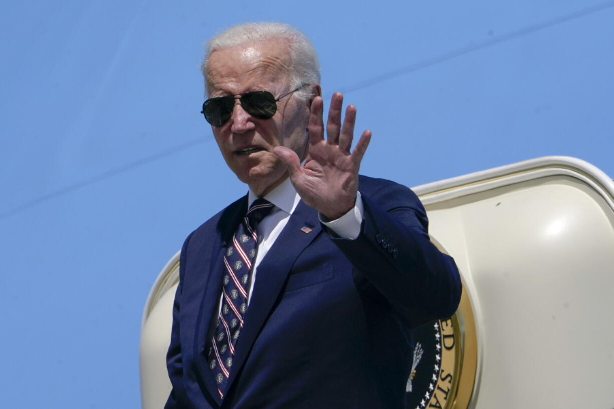 President Joe Biden waves before boarding Air Force One at Columbus International Airport in Columbus, Ohio, Friday, Sep. 9, 2022, after attending a groundbreaking for a new Intel computer chip facility in New Albany, Ohio.