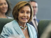 FILE - U.S. Speaker of the House Nancy Pelosi greets scientists gathered for a roundtable discussion at the National Center for Atmospheric Research on Aug. 31, 2022, in Boulder, Colo.  China's Foreign Ministry accused the United States of violating its commitment to the "one-China" principle and interfering in internal Chinese affairs on Thursday, Sept. 15, 2022, after the U.S.