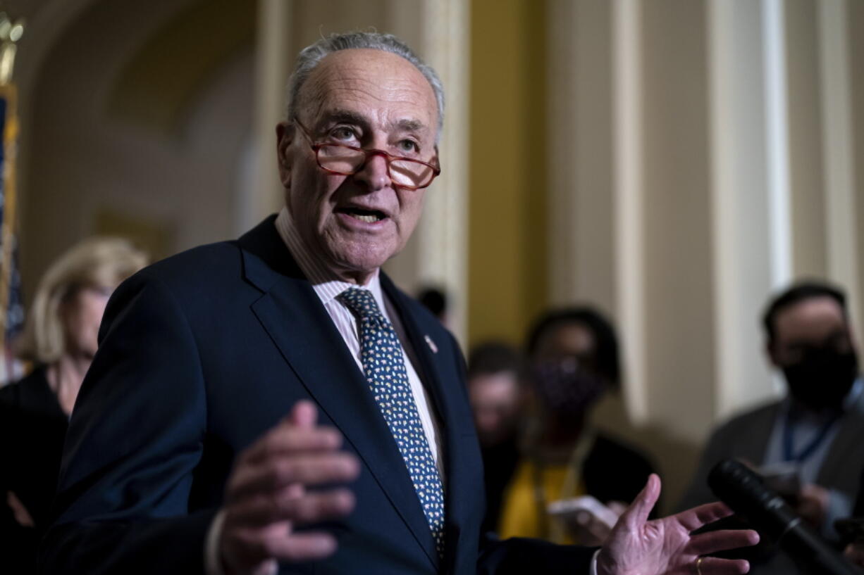 FILE - Senate Majority Leader Chuck Schumer, D-N.Y., speaks to reporters at the Capitol in Washington, Wednesday, Sept. 28, 2022. The Senate passed a short-term spending bill on Thursday that would avert a partial government shutdown when the current fiscal year ends at midnight Friday and provide another infusion of military and economic aid to Ukraine as it seeks to repel Russia's brutal invasion. (AP Photo/J.