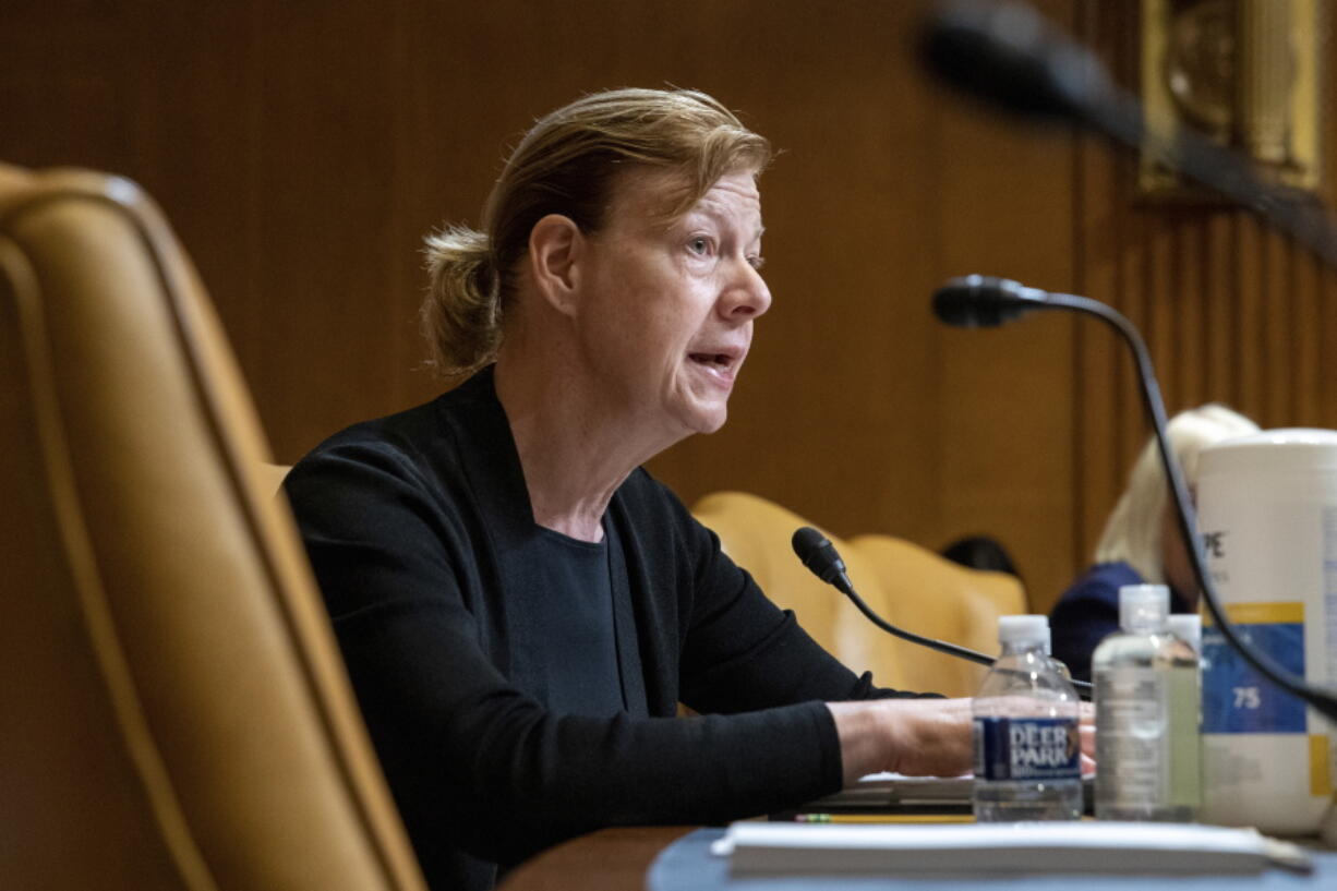 FILE - Sen. Tammy Baldwin, D-Wis., speaks during the Senate Appropriations Committee Subcommittee on Defense, May 3, 2022, on Capitol Hill in Washington. Democrats are punting a vote to protect same-sex and interracial marriages until after the November midterm elections. The request for a delay by senators who have been pushing for the legislation comes after Baldwin, the lead senator on the legislation, had predicted that they would be able to get the 10 Republican votes they need to break a filibuster.