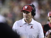 Washington State coach Jake Dickert watches during the first half of the team's NCAA college football game against Idaho, Saturday, Sept. 3, 2022, in Pullman, Wash.