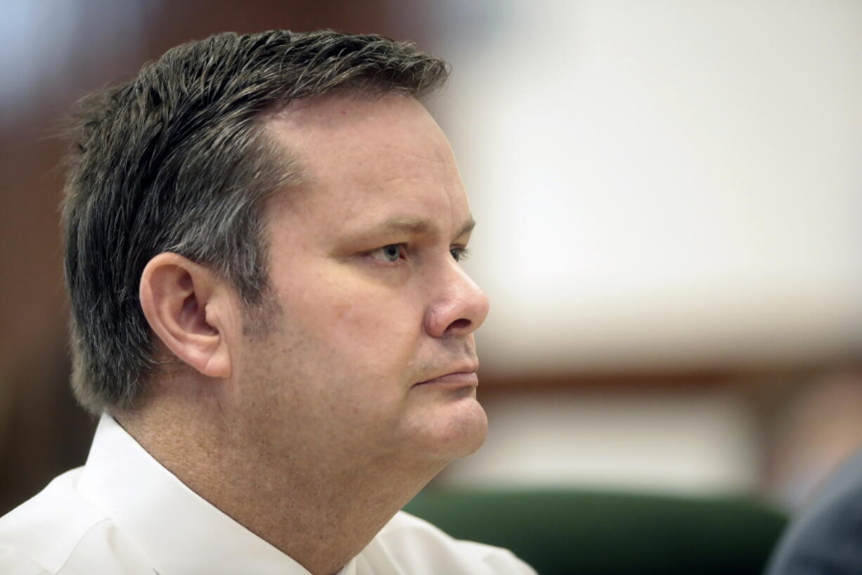 FILE - Chad Daybell sits during a court hearing on Aug. 4, 2020, in St. Anthony, Idaho. An Idaho judge has banned cameras from the courtroom in the high-profile triple murder case against a mom and her new husband, saying he fears the images could prevent a fair trial. Lori Vallow Daybell and her new husband Chad Daybell are accused of conspiring together to kill her two children and his late wife.