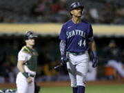 Seattle Mariners' Julio Rodriguez (44) walks back to the dugout after striking out against the Oakland Athletics during the fifth inning of a baseball game in Oakland, Calif., Tuesday, Sept. 20, 2022.