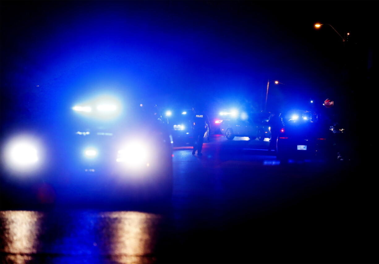 Memphis Police officers work an active shooter scene at Hodge Road and Ivan Road in Memphis, Tenn. Wednesday, Sept. 7, 2022. Police in Memphis, Tennessee, said a man who drove around the city shooting at people during an hours-long rampage that forced frightened people to shelter in place Wednesday has been arrested.