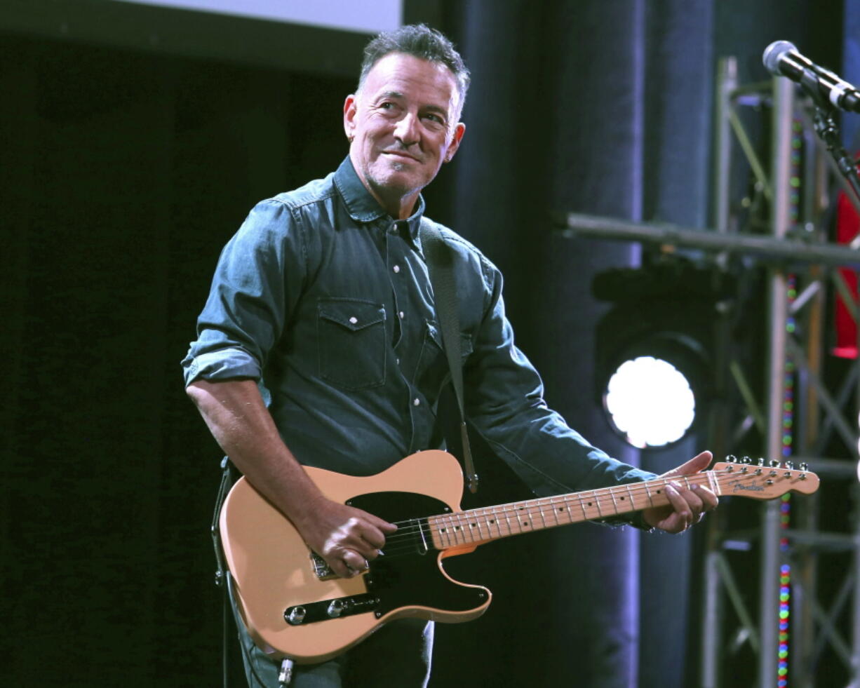 FILE - Bruce Springsteen performs at Stand Up For Heroes in New York on Nov. 1, 2016. Springsteen's most memorable artifacts will travel across the country with a new landing spot in Los Angeles. The Grammy Museum announced Wednesday that Bruce Springsteen Live! will open at the Grammy Museum L.A. Live in downtown Los Angeles on Oct. 15.