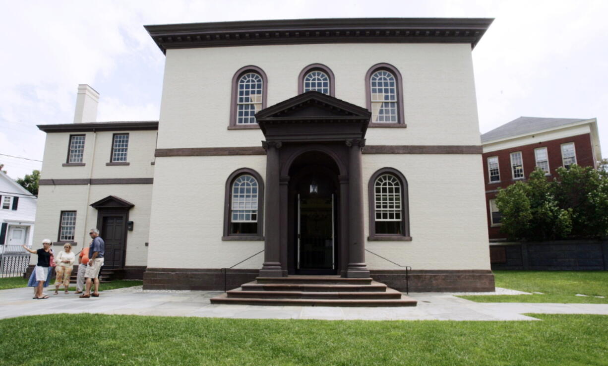 Visitors stand in 2009 outside the Touro Synagogue, in Newport, R.I., the oldest existing Jewish house of worship in the United States. (Eric J.