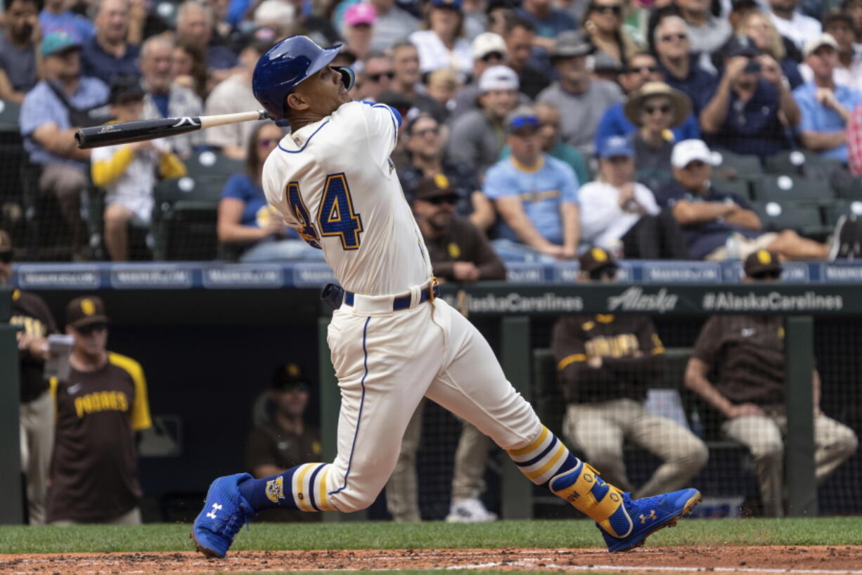 Seattle Mariners' Julio Rodriguez hits a single off San Diego Padres starting pitcher Mike Clevinger during the second inning of a baseball game, Wednesday, Sept. 14, 2022, in Seattle.