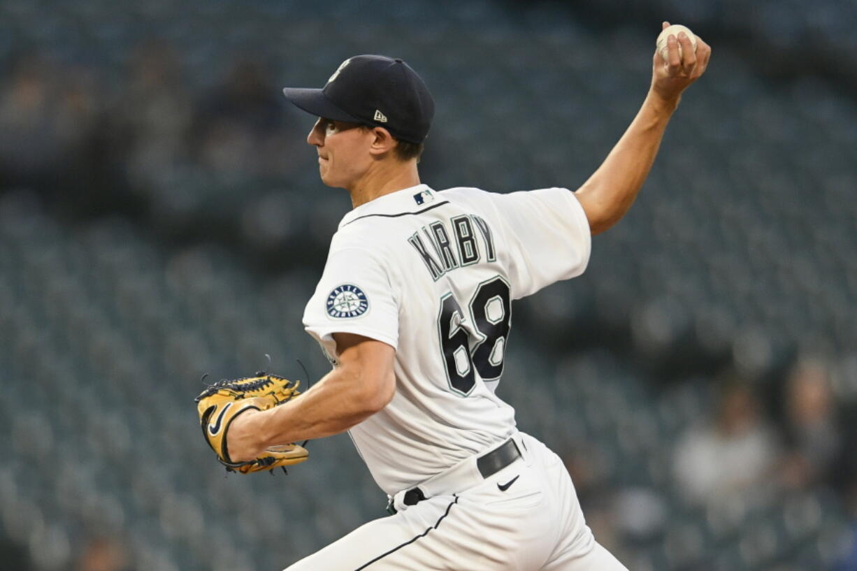 Seattle Mariners starting pitcher George Kirby throws against the Texas Rangers during the first inning of a baseball game, Wednesday, Sept. 28, 2022, in Seattle.