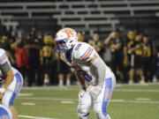 Ridgefield linebacker Wyatt Bartroff awaits the snap in the fourth quarter of a 2A Greater St. Helens League football game at Kiggins Bowl on Thursday, Sept. 22, 2022.