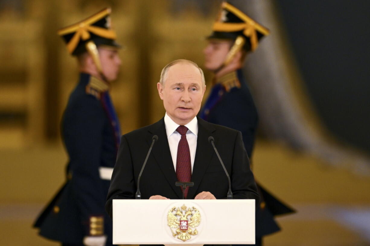 Russian President Vladimir Putin delivers his speech as he attends a ceremony to receive credentials from newly appointed foreign ambassadors to Russia in the Kremlin, in Moscow, Russia, Tuesday, Sept. 20, 2022.