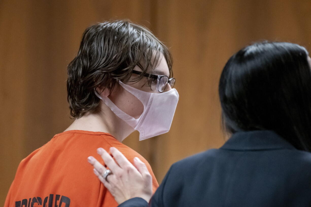 FILE - In this Feb. 22, 2022, photo, Ethan Crumbley, a teenager accused of killing four students in a shooting at Oxford High School, attends a hearing at Oakland County circuit court in Pontiac, Mich. A lawyer representing families of victims of a Michigan high school shooting says, Thursday, Sept. 22 some teachers and a counselor were aware of the suspect's troubling behavior months before the mass shooting last fall.