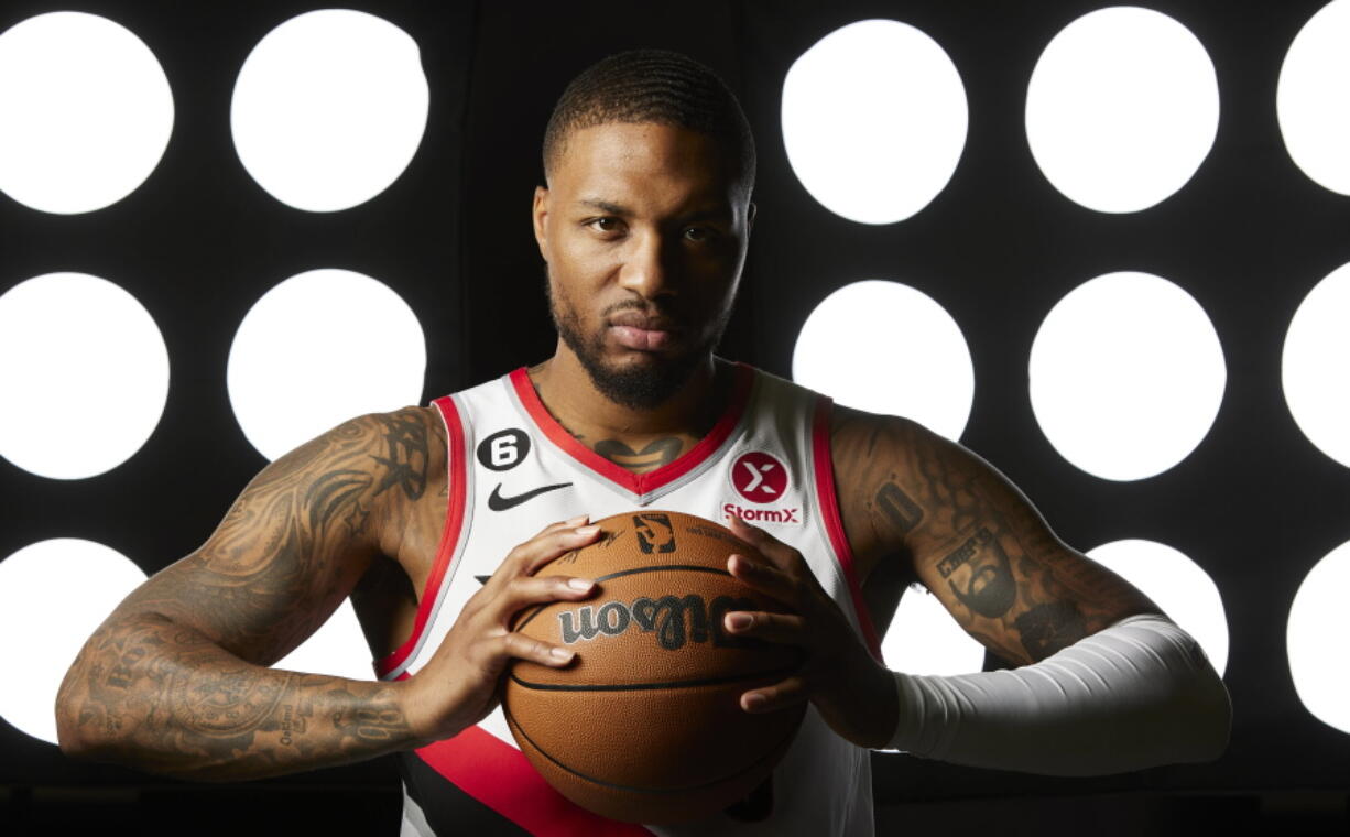 Portland Trail Blazers guard Damian Lillard poses during team's media day in Portland on Monday.