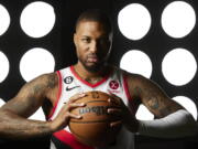 Portland Trail Blazers guard Damian Lillard poses during team's media day in Portland on Monday.