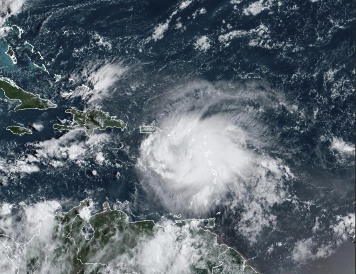 This satellite image provided by NOAA shows Tropical Storm Fiona in the Caribbean on Saturday, Sept. 17, 2022.