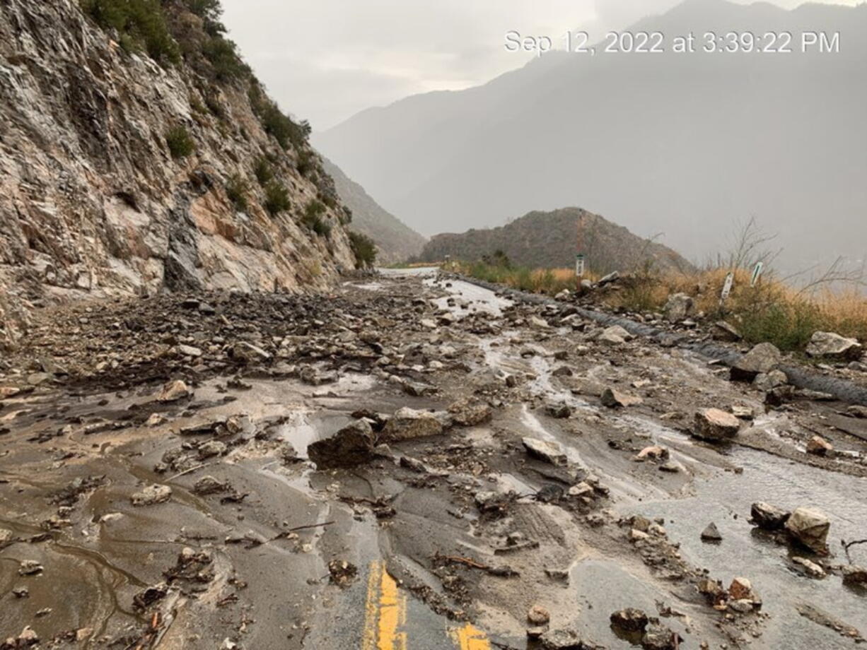 This Monday afternoon, Sept. 12, 2022, image released by Caltrans District 8 shows mudslides that closed part of Highway SR-38 in the San Bernardino Mountains, Calif. The mud flows and flash flooding occurred in parts of the San Bernardino Mountains where there are burn scars, areas where there's little vegetation to hold the soil, from the 2020 wildfires.