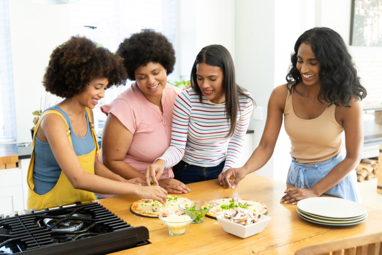 A kitchen island that allows multiple people to prepare food at the same is a great entertaining and gathering space.