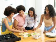 A kitchen island that allows multiple people to prepare food at the same is a great entertaining and gathering space.