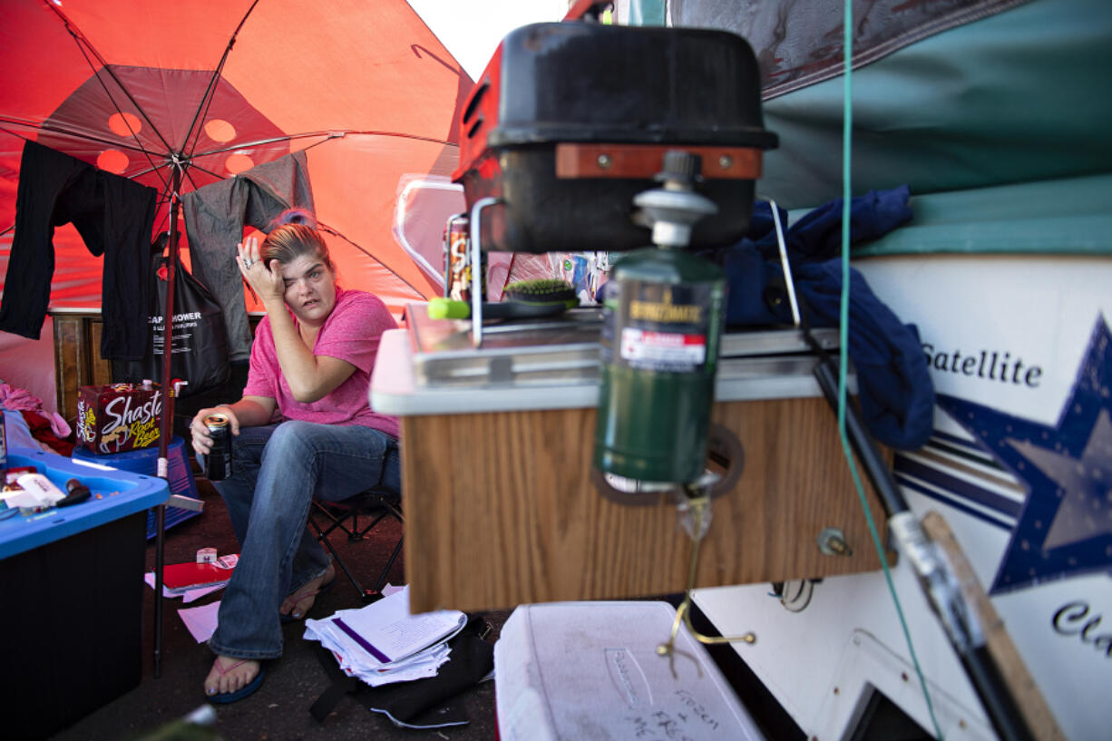 Kayla Sample, who was living at Vancouver's Evergreen Transit Center Safe Parking Zone with her son over the summer, fights back tears while talking about the lack of affordable housing in Clark County. In mid-September, the city removed her from the Safe Park and the state took her son out of her care. Now, Sample is back on the road with no stable place to call home.