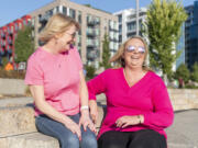 Vancouver resident Heather James, right, discovered a lump in her breast in 2020. She received treatment but the cancer returned in the same spot. She has relied on her friend Christina Stewart, also of Vancouver, for support. Stewart accompanied her to appointments to take notes.