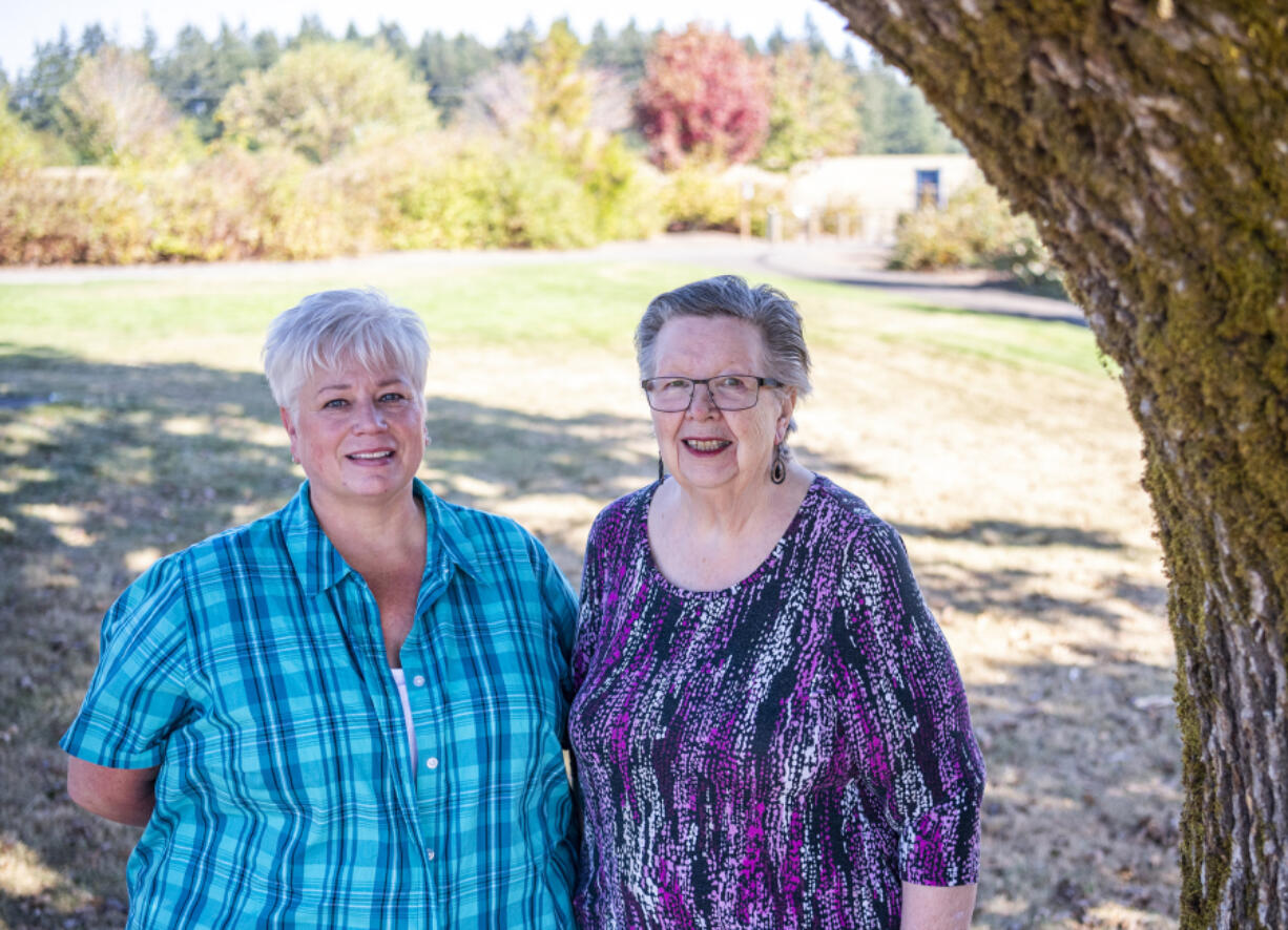 HOPE Dementia Support specialist and facilitator Lori Massie, left, and group facilitator Carol Becker, shown here at Vista Meadows Neighborhood Park in Vancouver, lead a group that is unique in providing supportive space for both caregivers and those with a dementia diagnosis.