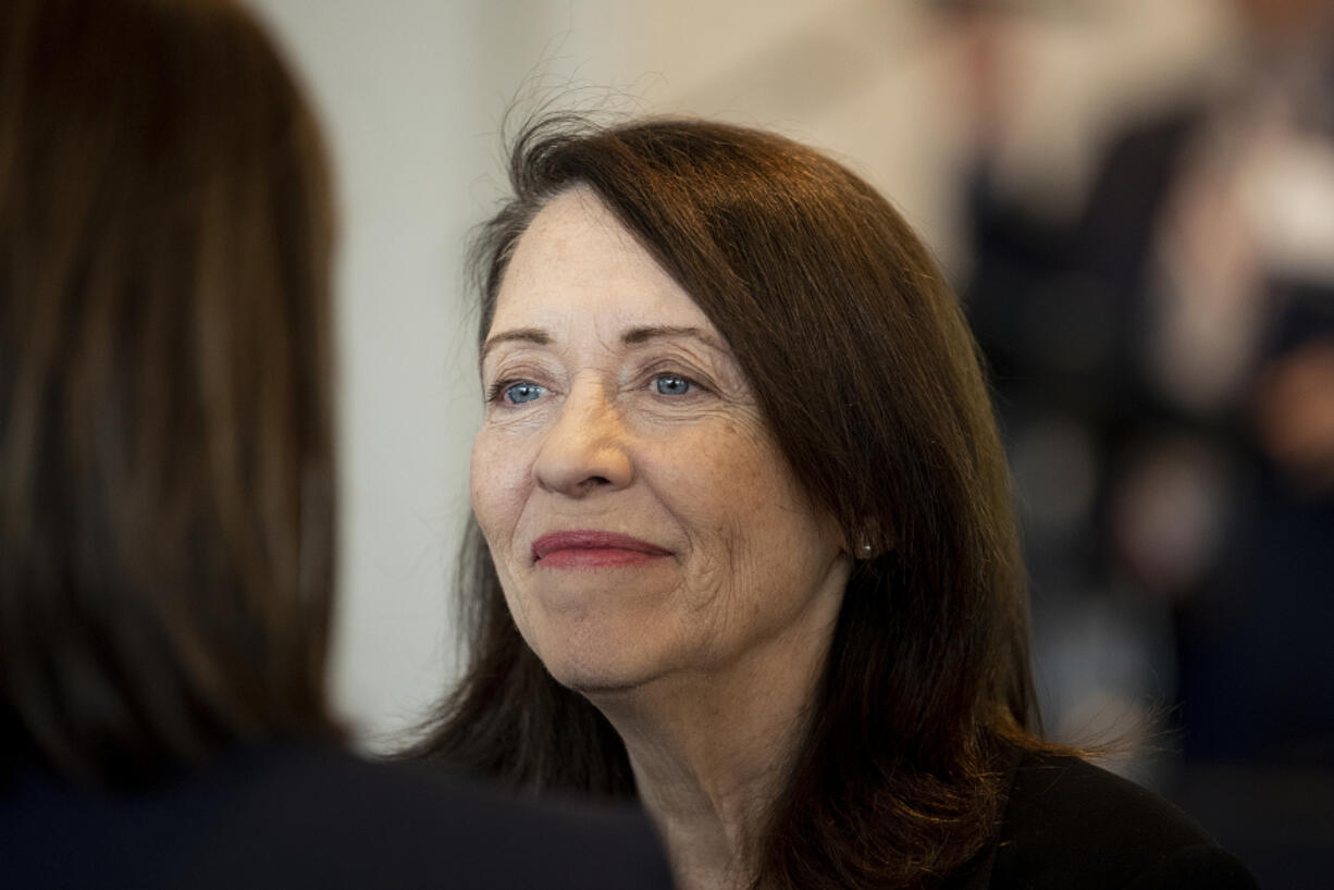 U.S. Sen. Maria Cantwell, D-Wash., speaks with people in the crowd before receiving Pacific Northwest Waterways Association's 2022 Legislator of the Year Award at AC Hotel by Marriott Vancouver Waterfront on Thursday.