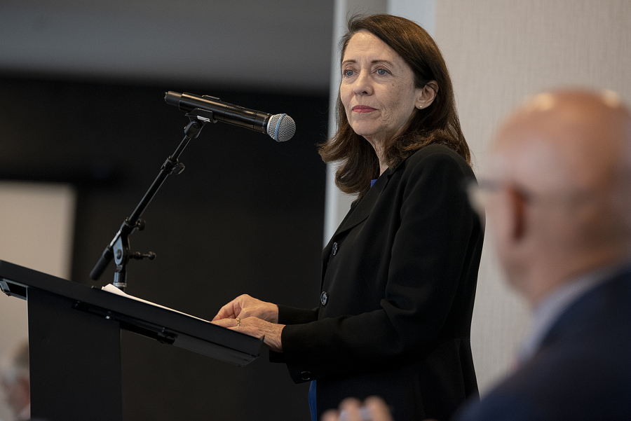 U.S. Sen. Maria Cantwell, D-Wash., speaks with people in the crowd before receiving Pacific Northwest Waterways Association's 2022 Legislator of the Year Award. She received the award in 2016 for introducing a grant program that helped reduce congestion at U.S. ports.