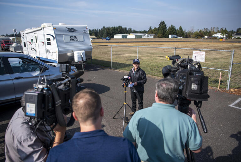 Sharon Steriti of the Washington Department of Natural Resources speaks in front of television cameras Monday, Sept. 17, 2022, during a media briefing at Grove Field in Camas. The Nakia Creek Fire ballooned to more than 1400 acres after dry and windy conditions on Sunday.