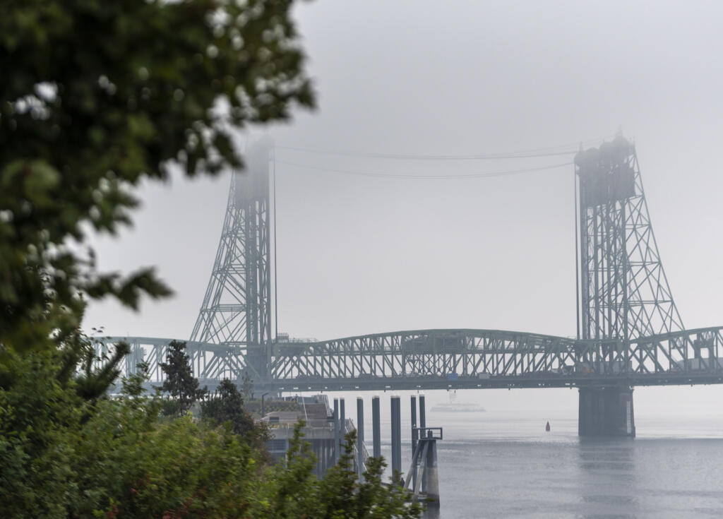 The Interstate 5 Bridge stretches across a hazy Columbia River on Tuesday, Sept. 18, 2022, as seen from the Vancouver Waterfront. Smoke from the Nakia Creek Fire and a morning layer of fog pushed air quality into the ÄúunhealthyÄù range.