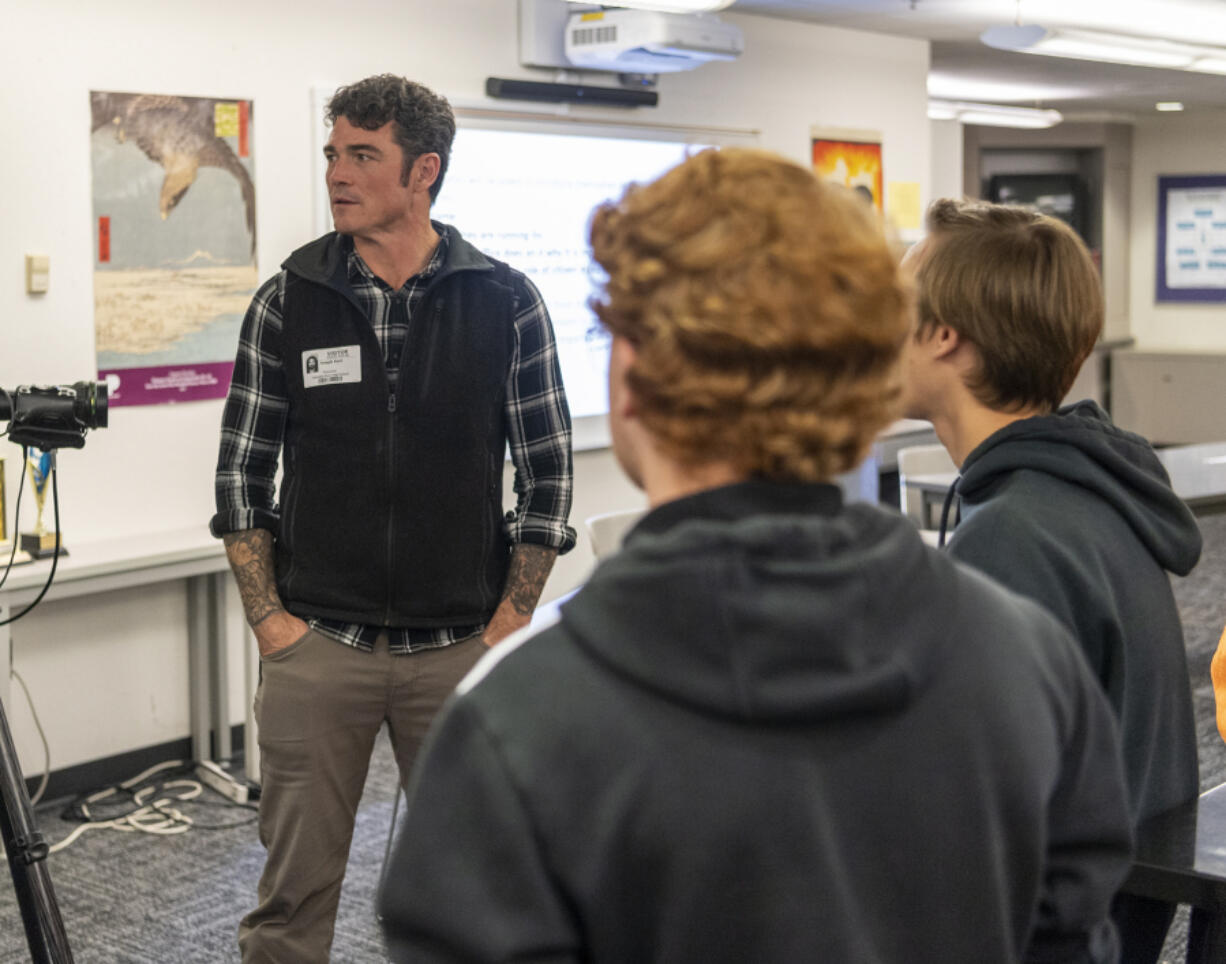 Republican candidate for Congress Joe Kent talks to students Tuesday during the first day of a local candidate forum at Columbia River High School.