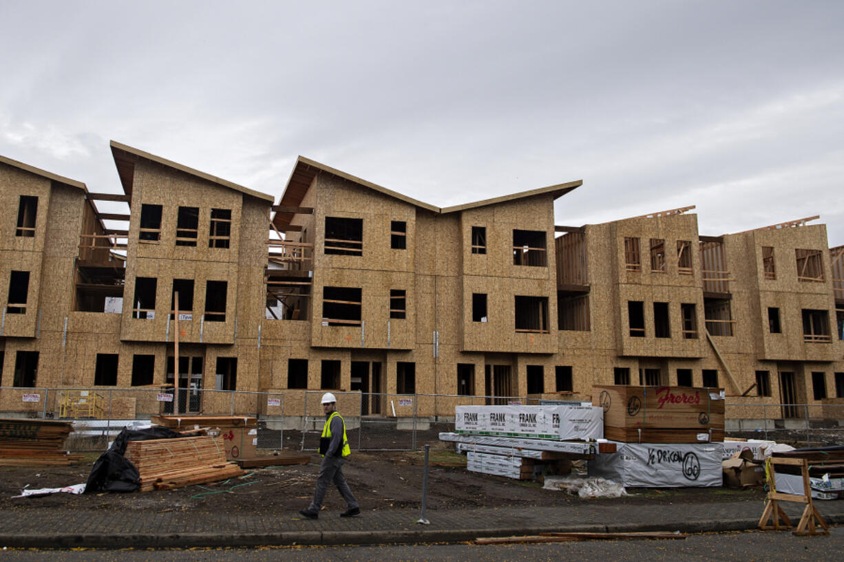 Riverside Townhomes, a 15-unit luxury development, is under construction near the Columbia River waterfront in Vancouver.