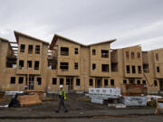 Riverside Townhomes, a 15-unit luxury development, is under construction near the Columbia River waterfront in Vancouver.