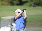 Mountain View's Grady Millar watches his drive on the No. 14 hole at Heron Lakes Golf Course in Portland during the 3A district golf tournament on Tuesday, Oct. 11, 2022.