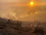 The sun sets over the Nakia Creek Fire.