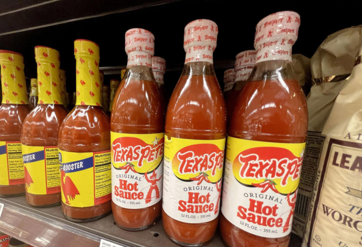 A California man is suing the company that makes Texas Pete hot sauce, accusing it of misleading customers with its name because its signature sauce is manufactured in North Carolina.