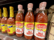 A California man is suing the company that makes Texas Pete hot sauce, accusing it of misleading customers with its name because its signature sauce is manufactured in North Carolina.