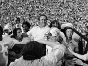 FILE - Miami Dolphins head coach Don Shula, center, is carried off the field after his team won the NFL football Super Bowl game over the Washington Redskins in Los Angeles, Jan. 14, 1973. It's quite likely no other Miami team will ever live up to that perfect '72 Dolphins team. That team has almost taken a larger-than-life meaning in the hearts and minds of sports fans. What that team did 50 years ago was difficult enough, but in today's NFL it's a nearly unattainable feat.