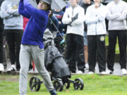 Columbia River’s Noah Larson hits his drive on the No. 1 hole at Orchard Hills Golf Club in Washougal during a playoff at the Class 2A District 4 golf tournament on Tuesday, Oct.