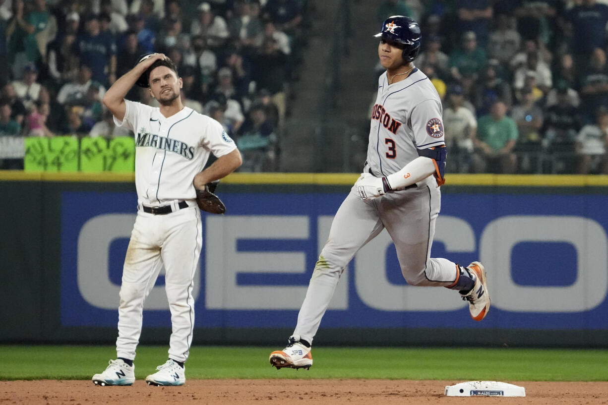 Houston Astros shortstop Jeremy Pena (3) rounds the bases after hitting a home run against the Seattle Mariners during the 18th inning in Game 3 of an American League Division Series baseball game Saturday, Oct. 15, 2022, in Seattle. (AP Photo/Ted S.