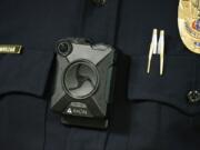 The Vancouver City Council has signed a contract with Axon Enterprises to provide the Vancouver Police Department with body-worn cameras, as shown here in 2019 in Phoenix. (AP Photo/Ross D.