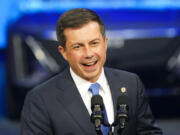 Secretary of Transportation Pete Buttigieg speaks at the North American International Auto Show in Detroit, Sept. 14, 2022.