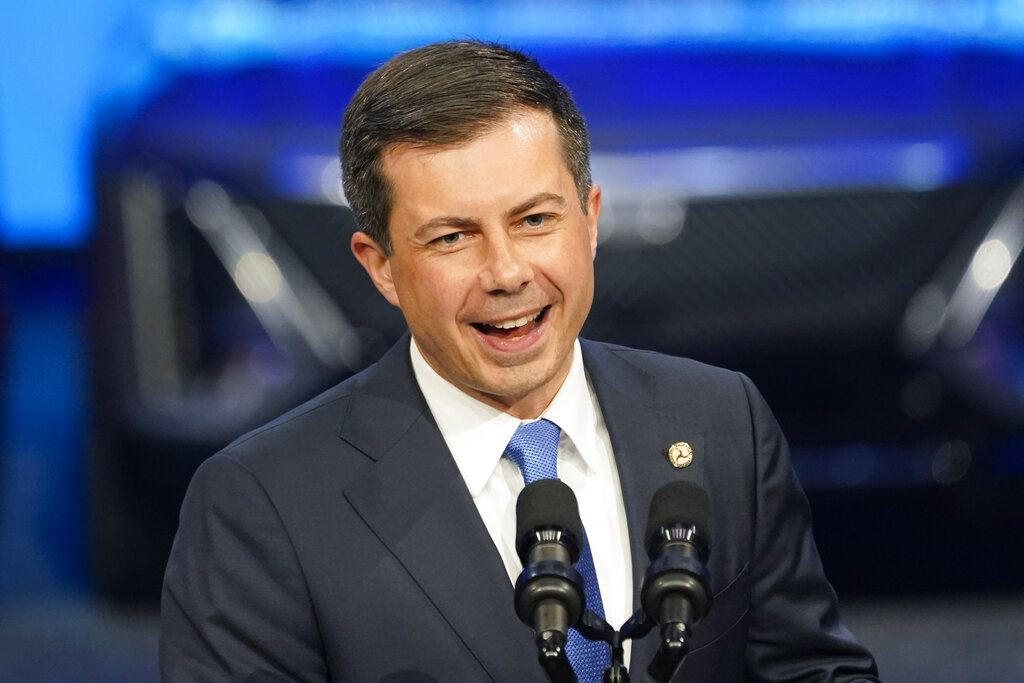 Secretary of Transportation Pete Buttigieg speaks at the North American International Auto Show in Detroit, Sept. 14, 2022.