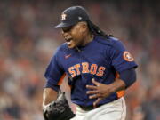 Houston Astros starting pitcher Framber Valdez celebrates a double play to end the top of the sixth inning in Game 2 of baseball's World Series between the Houston Astros and the Philadelphia Phillies on Saturday, Oct. 29, 2022, in Houston. (AP Photo/David J.