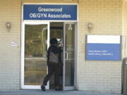 An individual enters the Greenwood OB/GYN Associates clinic across the street from the Greenwood Leflore Hospital in Greenwood, Miss., Oct. 21, 2022. (AP Photo/Rogelio V.