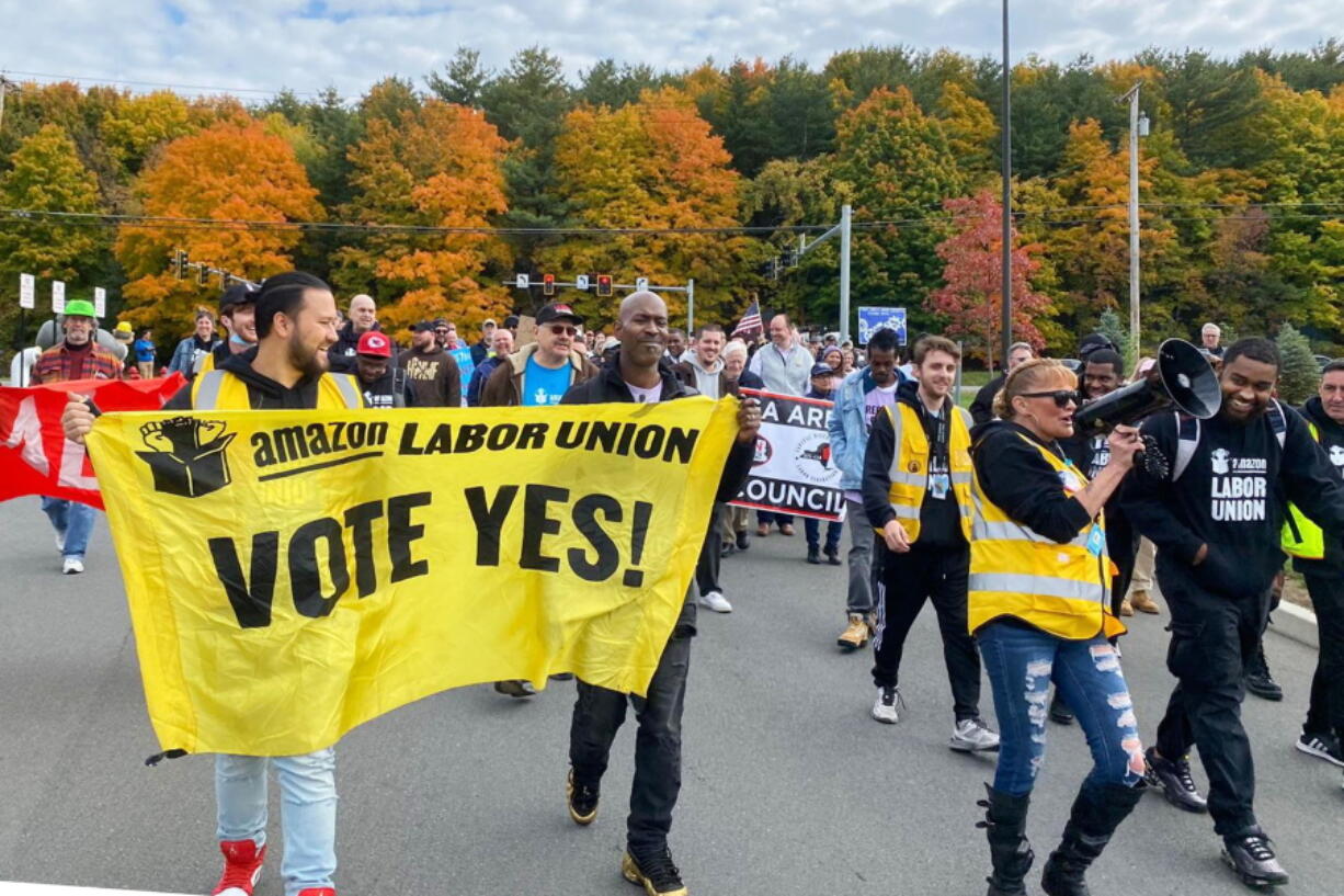 Amazon workers and supporters march during a rally in Castleton-On-Hudson, about 15 miles south of Albany, N.Y., Monday, Oct. 10, 2022. The startup union that clinched a historic labor victory at Amazon earlier this year is slated to face the company yet again, aiming to rack up more wins that could force the reluctant retail behemoth to the negotiating table.