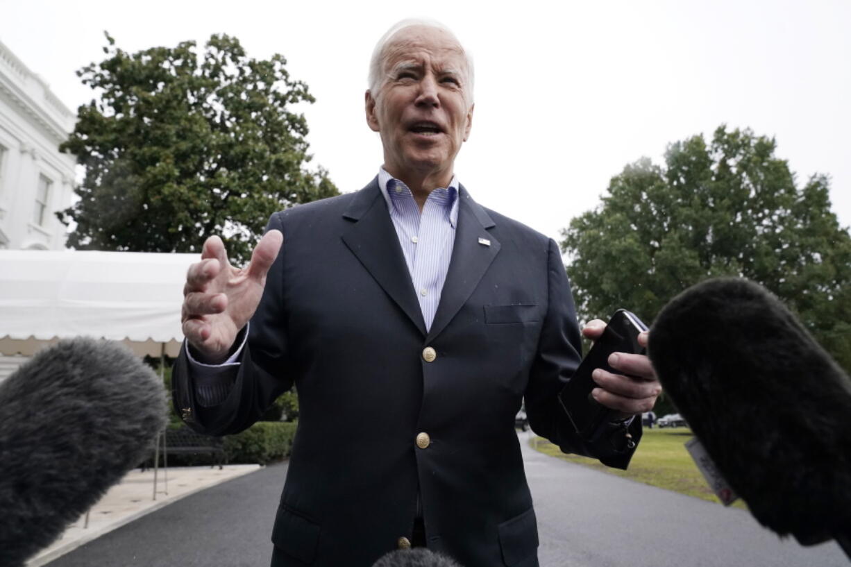 President Joe Biden speaks to the media before boarding Marine One on the South Lawn of the White House, Monday, Oct. 3, 2022, for a short trip to Andrews Air Force Base, Md., and then on to Puerto Rico.