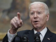 President Joe Biden calls on a reporter for a question after speaking about deficit reduction in the Roosevelt Room at the White House in Washington, Friday, Oct. 21, 2022. (AP Photo/J.