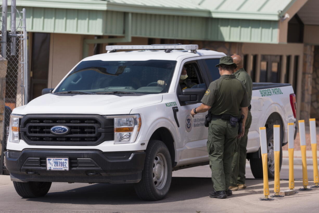 Border Patrol agents stand near the site where a Mexican detainee was fatally shot at the Ysleta Border Patrol Station, Tuesday, Oct. 4, 2022, in El Paso, Texas. According to officials, the man later died at an El Paso hospital. The Mexican Consulate in El Paso said in a statement that the man was a Mexican citizen who was being processed on criminal charges.